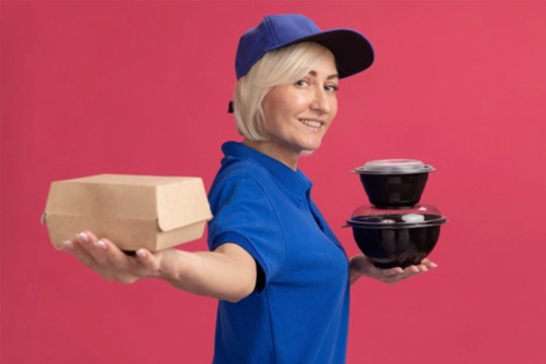 delivery woman showing food packaging product